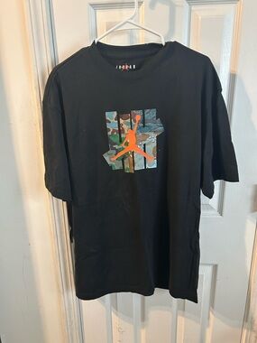 Jordan Black Short Sleeve Tee with Orange Jumpman and Camo Graphic